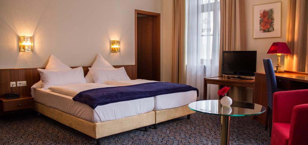 Stadthotel Констанц Стая снимка