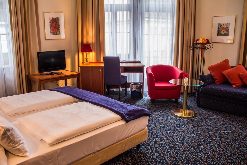 Stadthotel Констанц Стая снимка